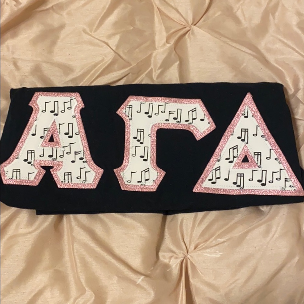 Alpha Gamma Delta Letters